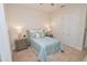 Spacious bedroom with neutral decor and ample closet space at 7814 Hidden Creek Loop # 104, Lakewood Ranch, FL 34202