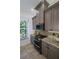 Well-equipped kitchen with stainless steel appliances and granite counters at 7814 Hidden Creek Loop # 104, Lakewood Ranch, FL 34202