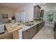 Spacious kitchen with granite countertops and ample cabinetry at 7814 Hidden Creek Loop # 104, Lakewood Ranch, FL 34202