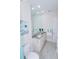 Modern bathroom with granite vanity and large mirror at 7814 Hidden Creek Loop # 104, Lakewood Ranch, FL 34202