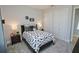 Guest bedroom with a full-size bed and double closets at 7780 Hidden Creek Loop # 101, Lakewood Ranch, FL 34202