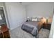 Comfortable bedroom with a full bed and double closets at 7780 Hidden Creek Loop # 104, Lakewood Ranch, FL 34202