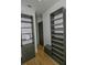 Large walk-in closet with ample shelving and hanging space at 7780 Hidden Creek Loop # 104, Lakewood Ranch, FL 34202