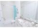 Clean bathroom with a tub and shower combination at 7730 Hidden Creek Loop # 102, Lakewood Ranch, FL 34202