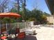 Private patio with seating area and fire pit at 7730 Hidden Creek Loop # 102, Lakewood Ranch, FL 34202