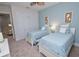 Bedroom with two twin beds and plenty of closet space at 7730 Hidden Creek Loop # 102, Lakewood Ranch, FL 34202