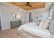Main bedroom with carpeted floor and wood ceiling at 7730 Hidden Creek Loop # 102, Lakewood Ranch, FL 34202