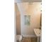 Small powder room with pedestal sink and toilet at 7730 Hidden Creek Loop # 102, Lakewood Ranch, FL 34202