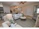 Open living room with a neutral color palette and plenty of seating at 7730 Hidden Creek Loop # 102, Lakewood Ranch, FL 34202