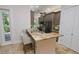 Modern kitchen with granite countertops and stainless steel appliances at 7730 Hidden Creek Loop # 102, Lakewood Ranch, FL 34202