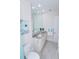 Modern bathroom with vanity and large mirror at 7730 Hidden Creek Loop # 102, Lakewood Ranch, FL 34202