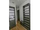 Large walk-in closet with ample shelving and hanging space at 7834 Hidden Creek Loop # 104, Lakewood Ranch, FL 34202