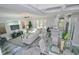 Open floor plan encompassing the living, dining, and kitchen areas at 7834 Hidden Creek Loop # 104, Lakewood Ranch, FL 34202