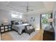 Spacious main bedroom with hardwood floors and ample natural light at 7834 Hidden Creek Loop # 104, Lakewood Ranch, FL 34202