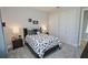 Comfortable bedroom with a full-size bed and plenty of closet space at 7834 Hidden Creek Loop # 104, Lakewood Ranch, FL 34202