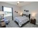 Cozy bedroom with a queen-size bed and ample closet space at 7834 Hidden Creek Loop # 104, Lakewood Ranch, FL 34202