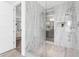 Large walk-in shower with marble tile and dual shower heads at 44 Bayview S Ct # A, St Petersburg, FL 33711