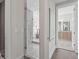 Spa-like bathroom with walk-in shower, soaking tub, and modern finishes at 44 Bayview S Ct # A, St Petersburg, FL 33711