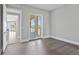 Bright bedroom with hardwood floors and access to balcony at 44 Bayview S Ct # A, St Petersburg, FL 33711