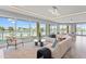 Spacious living area with stunning water views and comfortable seating at 44 Bayview S Ct # A, St Petersburg, FL 33711