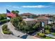 Gated community entrance with a sales center and lush landscaping at 44 Bayview S Ct # A, St Petersburg, FL 33711