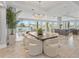 Open concept dining area with modern table and chairs at 44 Bayview S Ct # A, St Petersburg, FL 33711