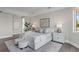 Elegant bedroom with large windows and calm decor at 44 Bayview S Ct # A, St Petersburg, FL 33711