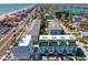 Aerial view of property with rooftops and a street view of the surrounding community at 15405 Gulf Blvd # B1, Madeira Beach, FL 33708