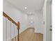 Bright entry way features light wood flooring and a modern door at 15405 Gulf Blvd # B1, Madeira Beach, FL 33708