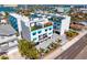 Modern condo building with a coastal aesthetic, roof top terraces, and charming awnings at 15405 Gulf Blvd # B1, Madeira Beach, FL 33708