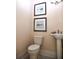 Clean and modern powder room with pedestal sink at 1413 Bayshore Blvd # 10, Dunedin, FL 34698