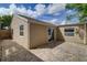 Backyard patio with sliding glass door access at 4451 Tidal Pond Rd, New Port Richey, FL 34652