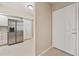 Entryway with a stainless steel refrigerator and a white door at 1200 Country Club Dr # 6103, Largo, FL 33771