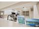 Bright kitchen with stainless steel appliances and view of golf course community enhances the atmosphere at 1200 Country Club Dr # 6103, Largo, FL 33771