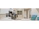 Kitchen with stainless steel appliances, white cabinets, and a bright view with lots of counterspace at 1200 Country Club Dr # 6103, Largo, FL 33771
