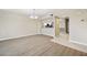 Open concept living area flows into kitchen with hardwood floors and modern design enhances living space at 1200 Country Club Dr # 6103, Largo, FL 33771