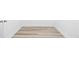 Light colored vinyl flooring complements the bright white walls and trim at 400 150Th Ave # 302, Madeira Beach, FL 33708