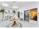 Bright lobby featuring elegant decor, modern elevators, and nautical-themed accents at The Residences at Town Center at 400 150Th Ave # 302, Madeira Beach, FL 33708