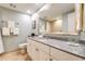 Bathroom with shower, toilet, and granite vanity at 36750 Us Highway 19 N # 21305, Palm Harbor, FL 34684
