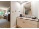 Vanity with sink, granite countertop, and coffee maker at 36750 Us Highway 19 N # 21305, Palm Harbor, FL 34684