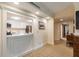 Small, galley-style kitchen with white cabinets at 36750 Us Highway 19 N # 21305, Palm Harbor, FL 34684