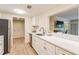 Modern kitchen with white cabinets, stainless steel appliances, and quartz countertops at 36750 Us Highway 19 N # 21305, Palm Harbor, FL 34684