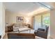 Relaxing living room with sofa, armchairs, and access to a private balcony at 36750 Us Highway 19 N # 21305, Palm Harbor, FL 34684