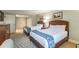 Bedroom with two double beds, nightstands, and dresser at 36750 Us Highway 19 N # 21305, Palm Harbor, FL 34684