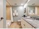Bathroom with shower, toilet, and granite vanity at 36750 Us Highway 19 N # 21305, Palm Harbor, FL 34684