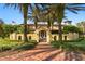 Grand estate entrance with brick walkway and wrought iron gates at 33642 Blanton Rd, Dade City, FL 33523