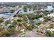 An aerial view of the property with a river nearby and surrounding residential area at 2608 N Ridgewood Ave, Tampa, FL 33602