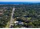 Aerial view showing home's location and proximity to main road and water at 2011 Belleair Rd, Clearwater, FL 33764