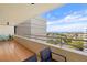 Spacious balcony with chairs and stunning water views at 5940 Pelican Bay S Plz # 1204, Gulfport, FL 33707
