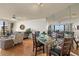 Dining room with glass table and hardwood floors at 5940 Pelican Bay S Plz # 1204, Gulfport, FL 33707